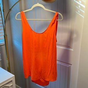 New with tags. Orange top.